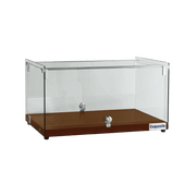 Ambient cake display with flat clear glass and walnut-colored timber base.