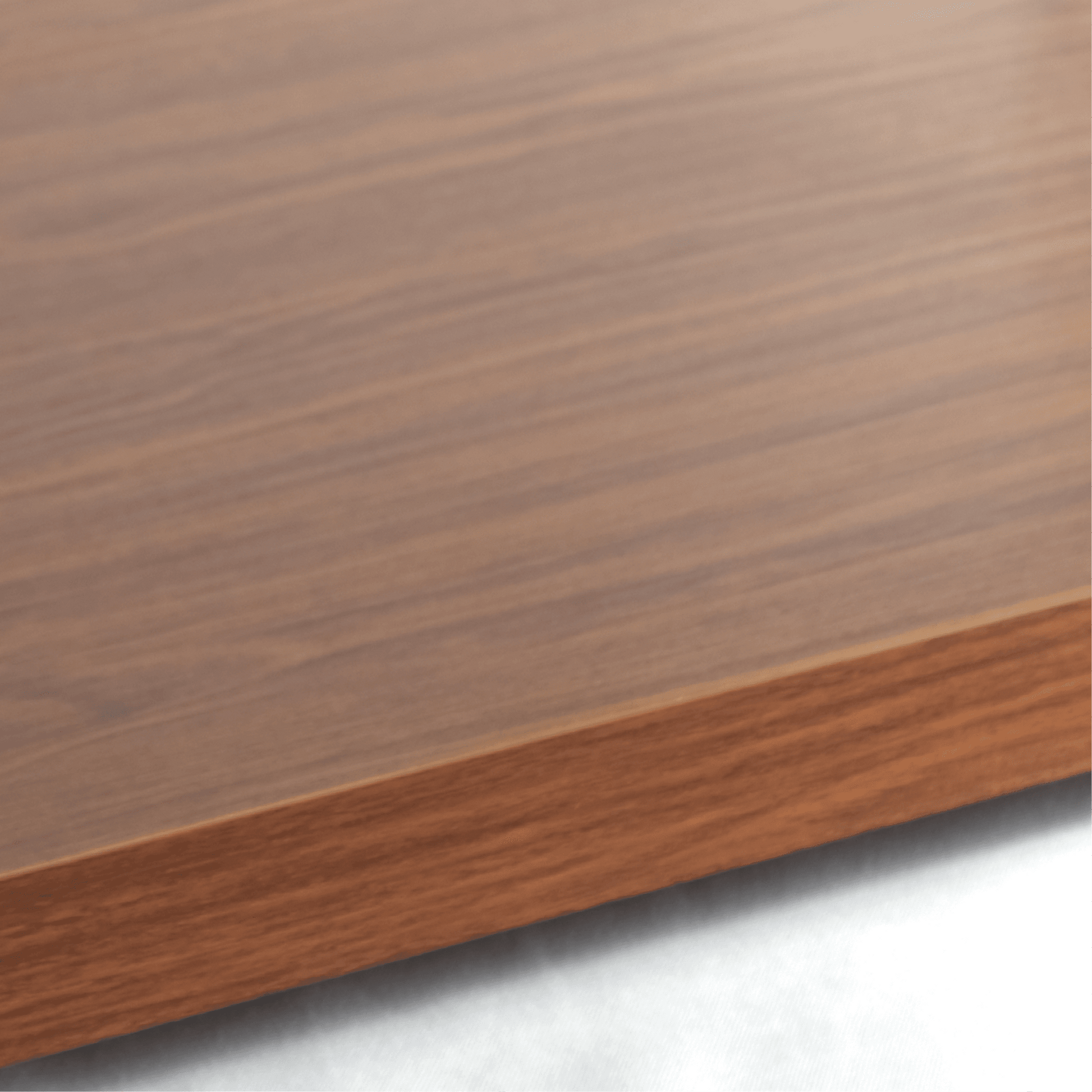 Close-up of flat glass tier with elegant walnut wood frame showing fine grain texture and smooth finish.