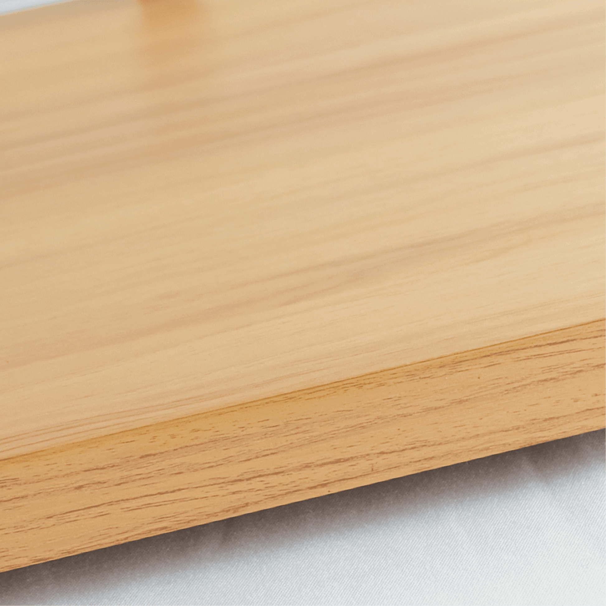 Natural oak timber base with smooth finish and subtle wood grain texture.