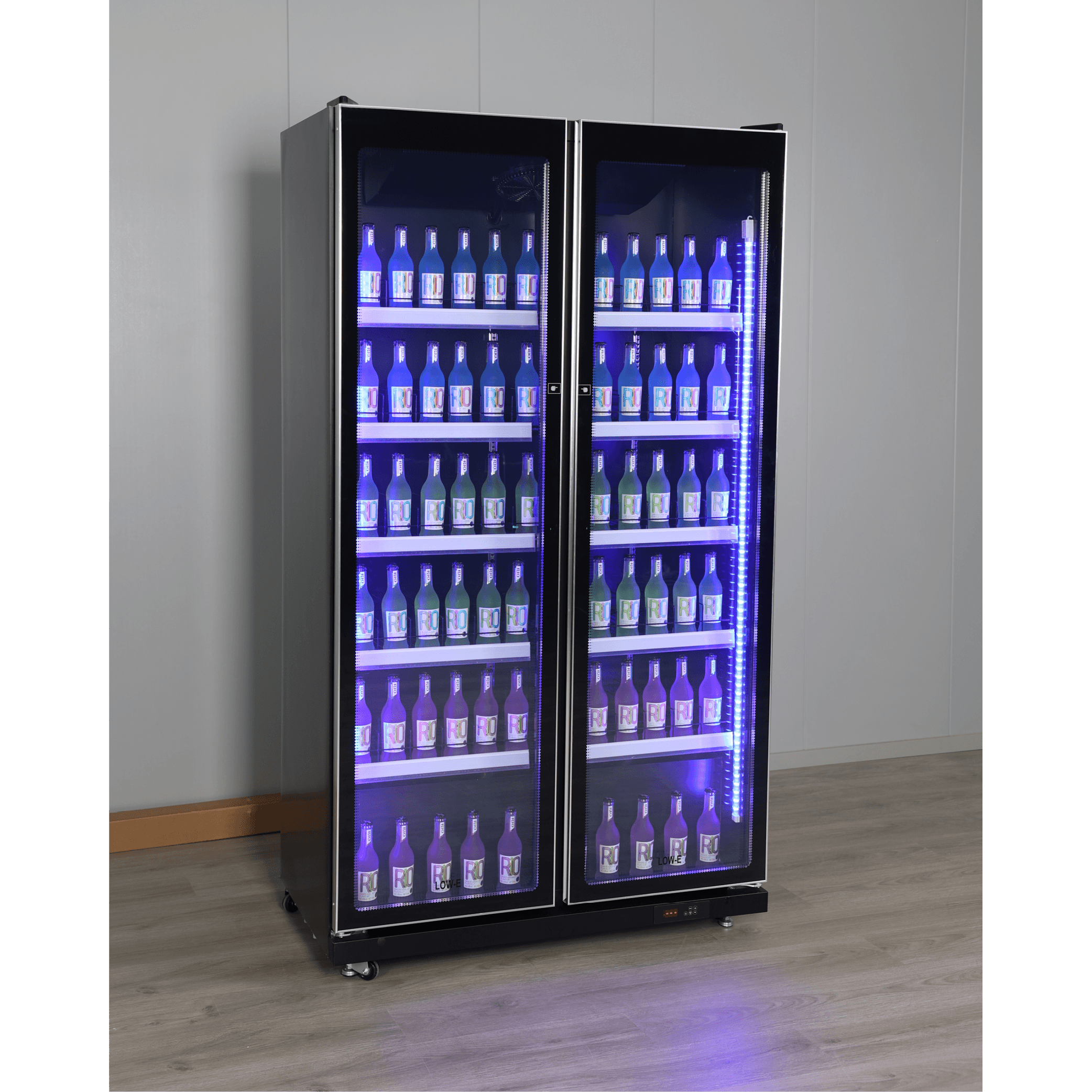 Black upright display refrigerator with two glass doors, illuminated shelves stocked with bottled beverages.