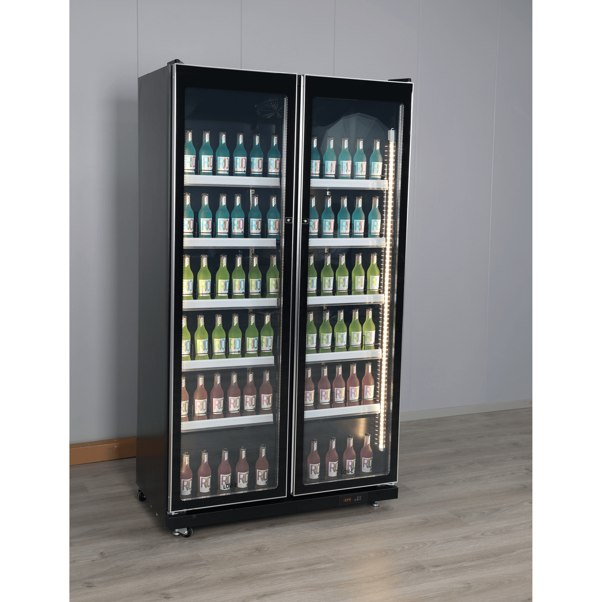 Black double-door upright display refrigerator with glass panels showing rows of bottled beverages inside.