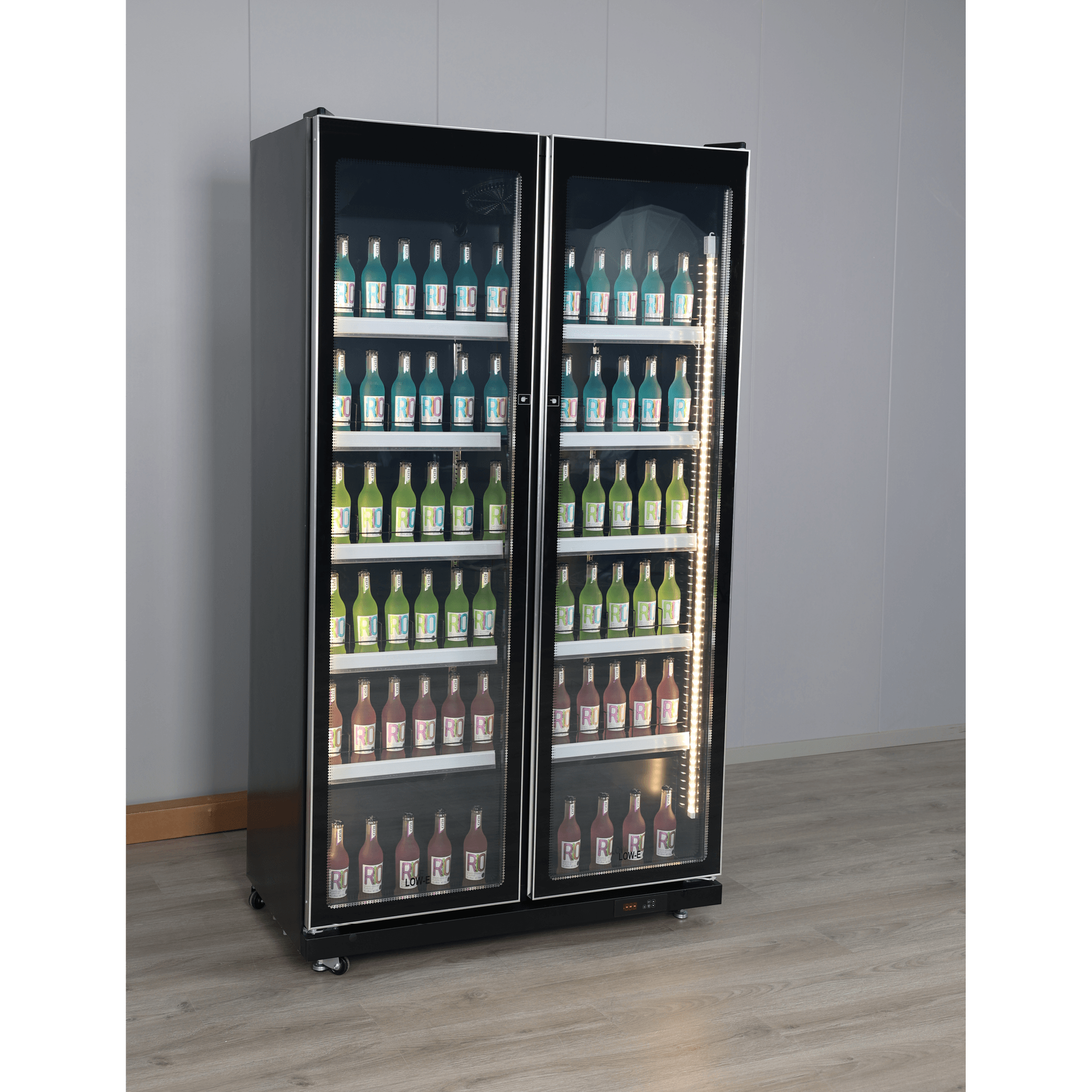 Black double-door upright display refrigerator with glass panels showing rows of bottled beverages inside.