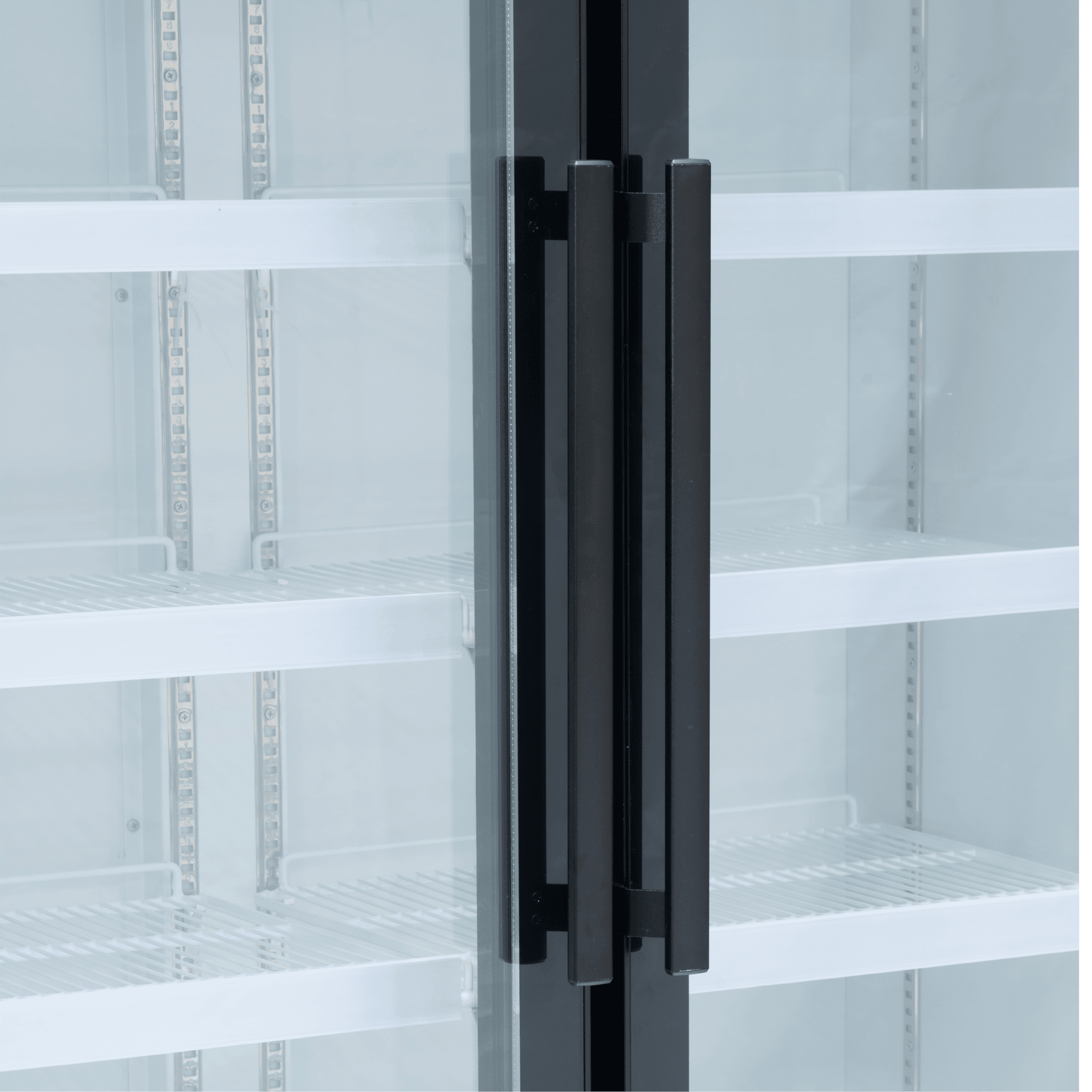 Black upright refrigerator with two glass doors and black vertical handles, showing white interior shelves.