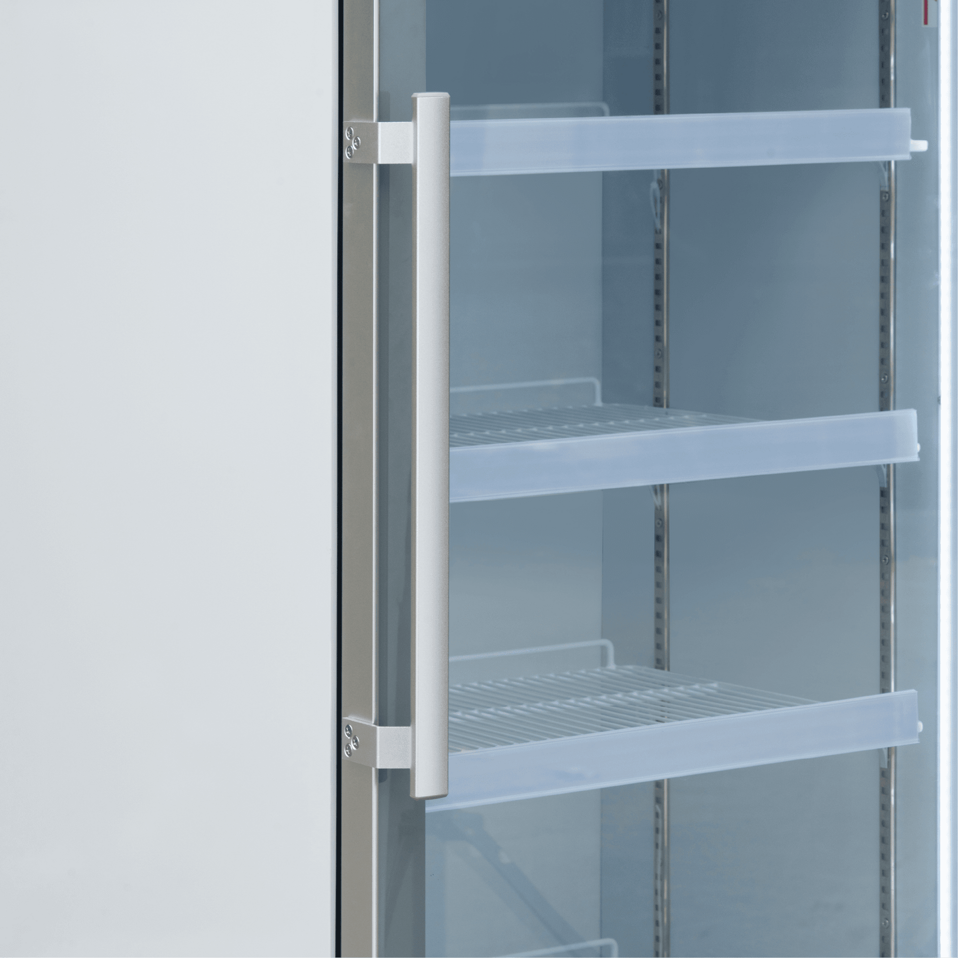 White upright display refrigerator with one glass door, three adjustable glass shelves, and a vertical stainless steel.
