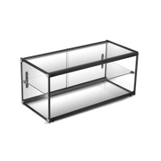 Two-tier rectangular glass ambient cake display with black frame and glass panels.