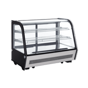 Compact curved glass cake display refrigerator with stainless steel base and two wire shelves.