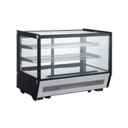 Square countertop cake display refrigerator with stainless steel base and glass panels, three interior wire shelves.