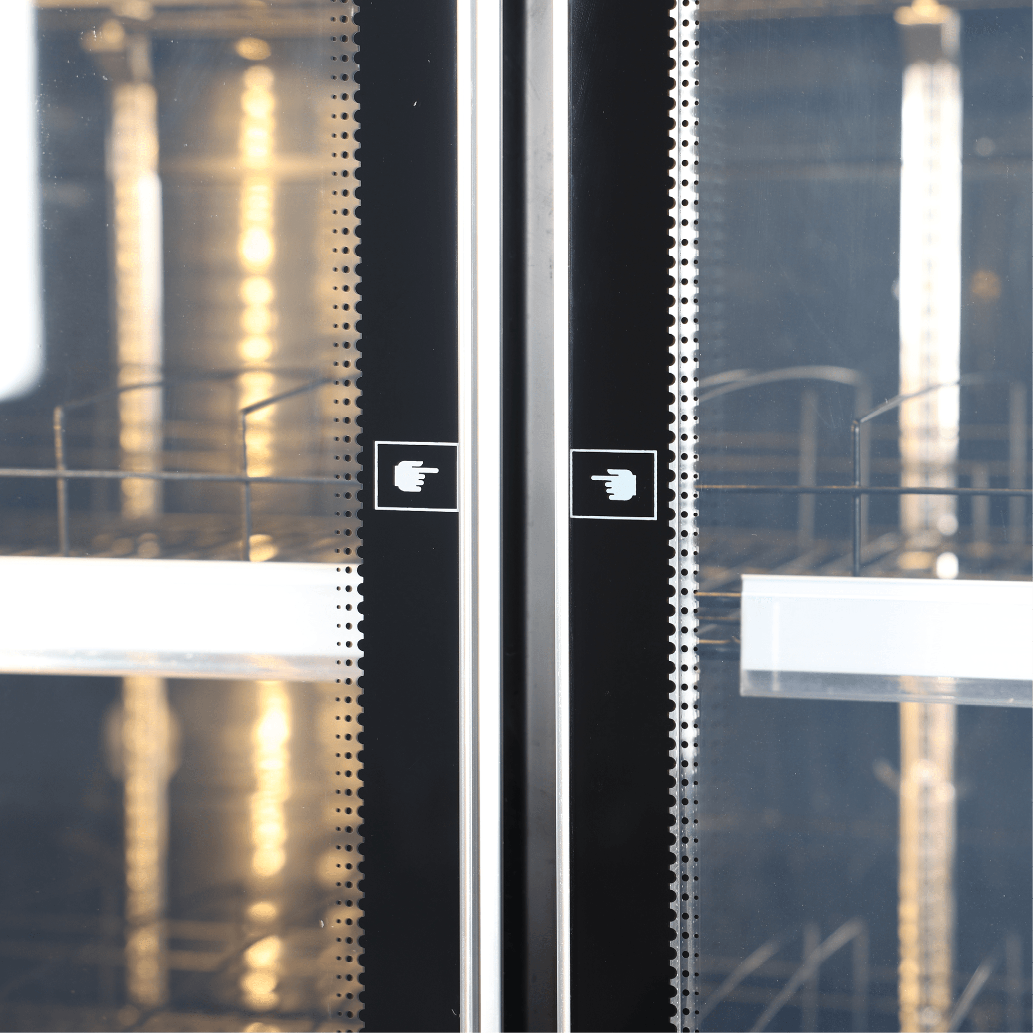 Black upright display refrigerator with three glass doors and stainless steel handles.