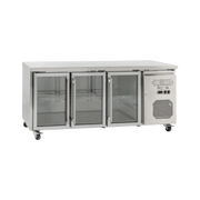 Stainless steel underbench refrigerator with three glass doors and caster wheels.