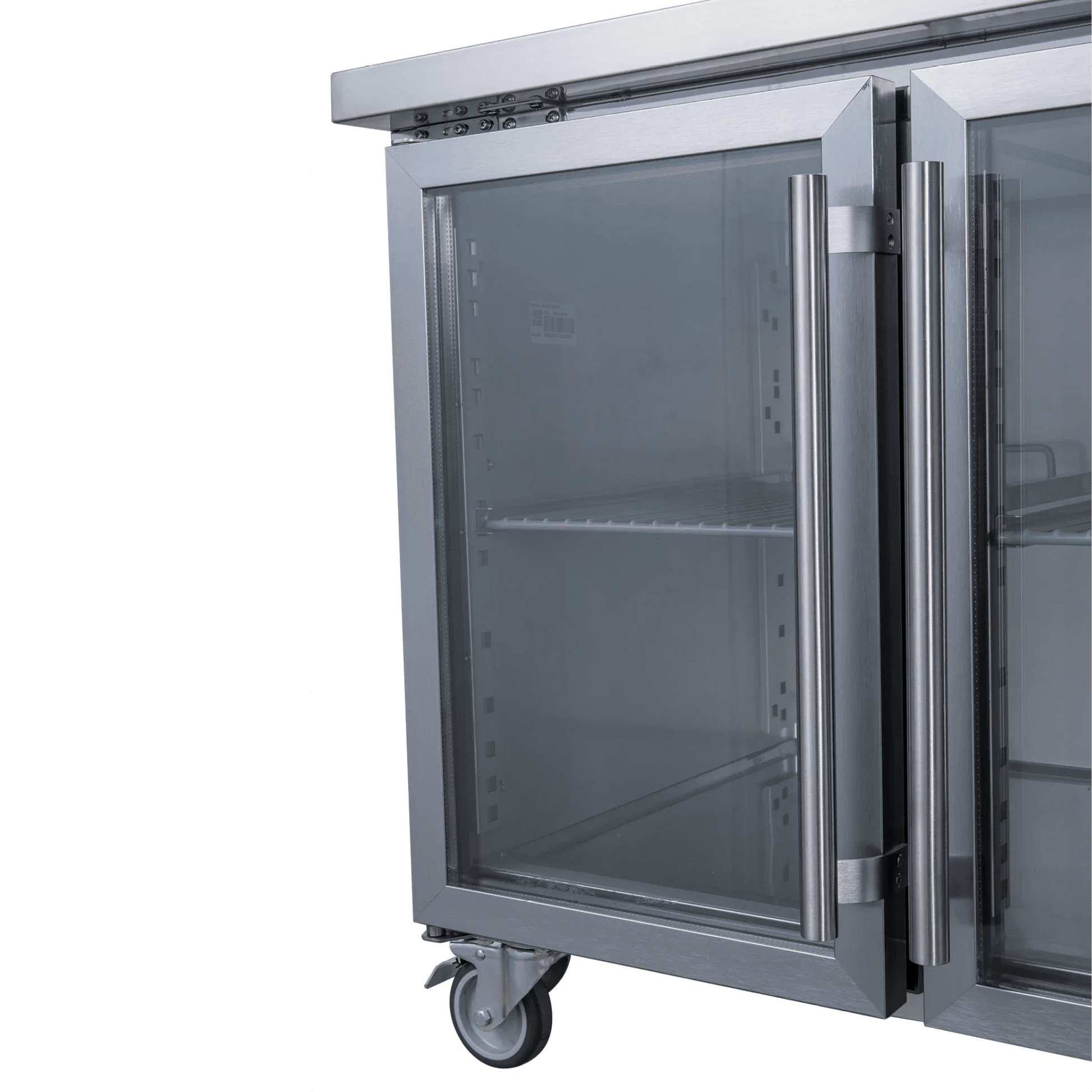 Stainless steel underbench refrigerator with two glass doors and caster wheels, showing interior shelving.