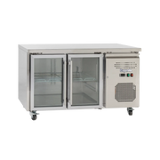 Stainless steel underbench refrigerator with two glass doors and internal shelving on caster wheels.