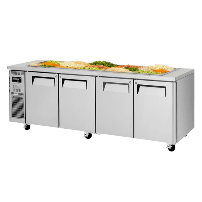 Stainless steel 4-door underbench salad prep fridge with casters and top salad containers.