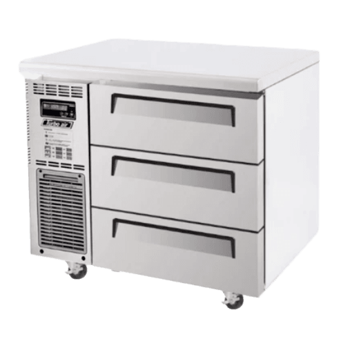 Stainless steel 3-drawer underbench freezer with ventilation panel and caster wheels.