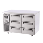 Stainless steel underbench fridge with six pull-out drawers and digital temperature display on left panel.