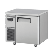 Stainless steel underbench fridge with single solid door and ventilation grille on the left side.