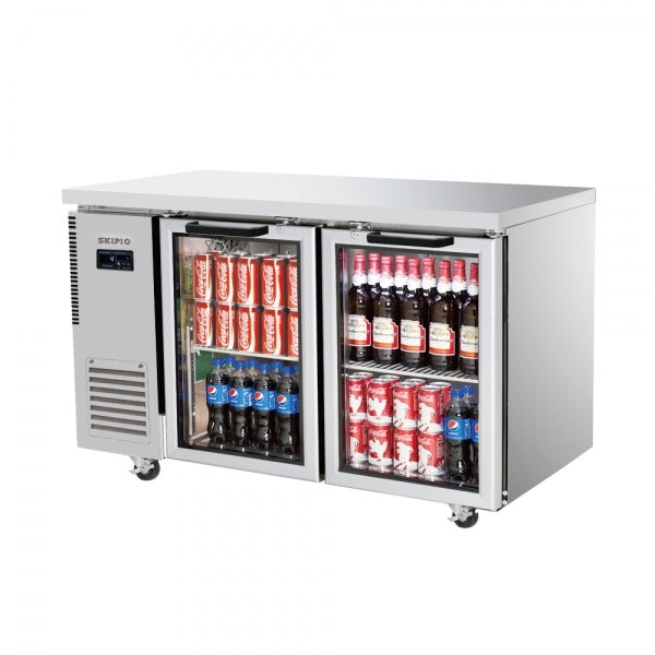 Under counter stainless steel fridge with two glass doors, stocked with soda cans and bottled drinks.