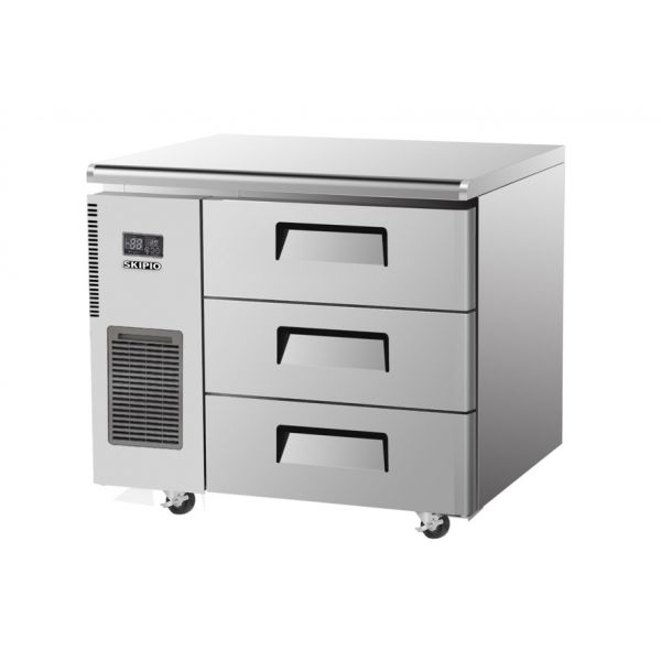 Stainless steel under counter fridge with three pull-out drawers and digital control panel on the left side on caster wheels.