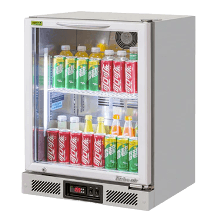 Compact stainless steel back bar fridge with single glass door and LED-lit shelves displaying assorted soft drinks.