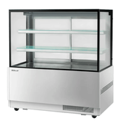 Stainless steel refrigerated cake display with two glass shelves and clear glass front and sides.