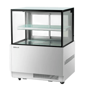 Compact refrigerated cake display with black trim, single glass shelf, and white base unit.