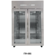 Stainless steel upright fridge with two glass doors and high top mount compressor on wheels.